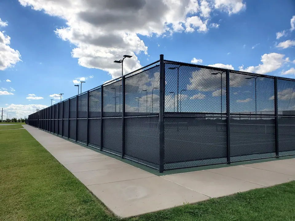 black commercial fence install